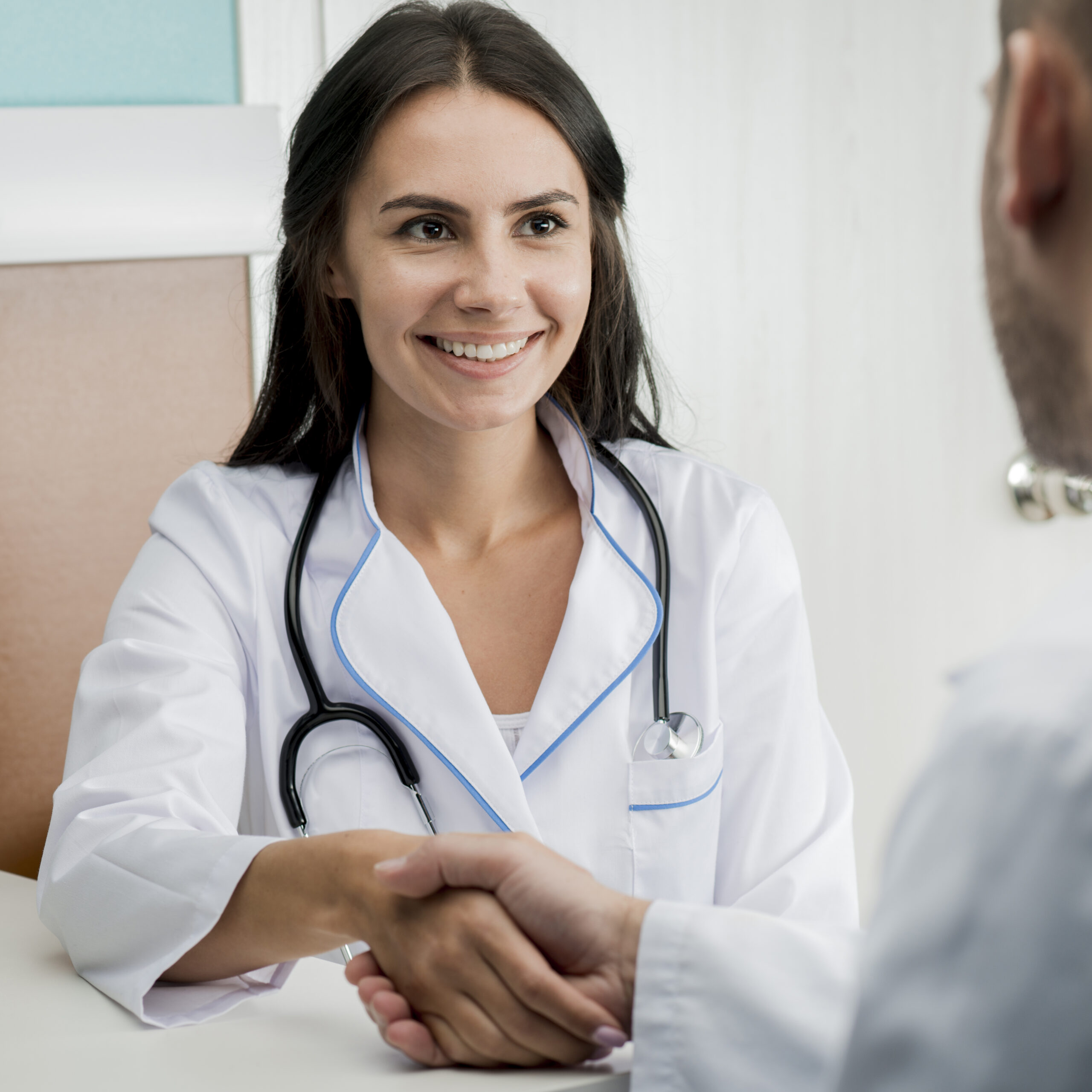 cheerful-medics-handshaking