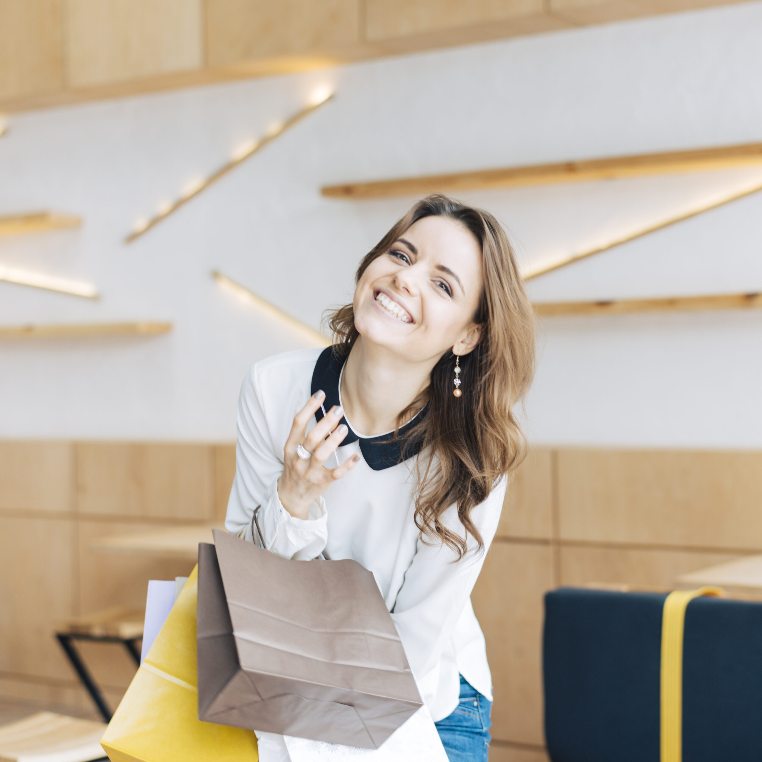 laughing-woman-with-paper-bags